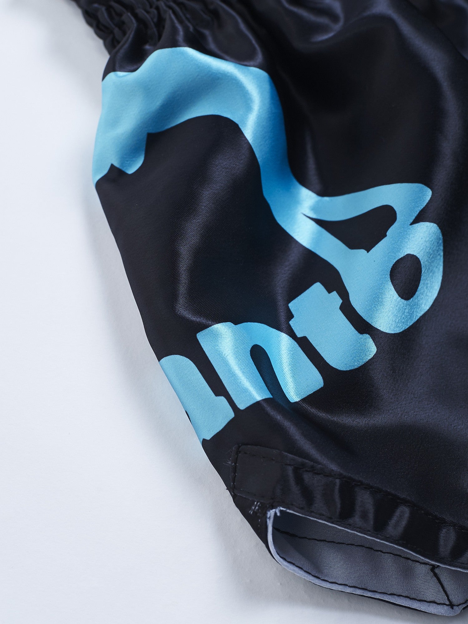 MANTO spodenki MUAY THAI DUAL Czarne/Niebieskie
