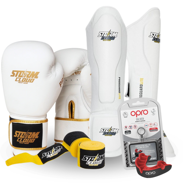 Zestaw Kickboxing Premium Rękawice Boxing Pro Biało-Złote + Bandaże 4M + Szczęka OPRO UFC Silver + Piszczele Lite Białe