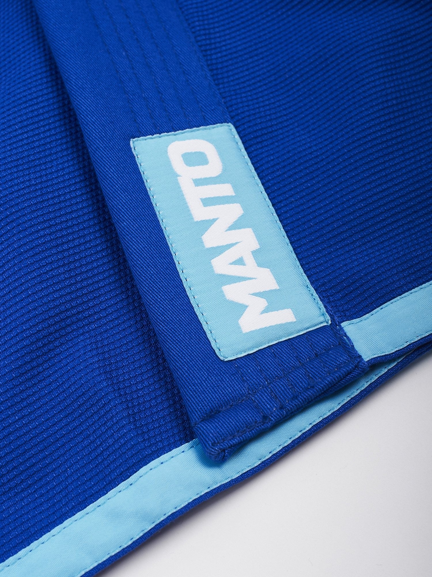 MANTO Kimono/Gi dla dzieci Junior 2.0 Niebieskie + Biały Pas